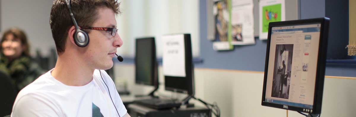 Access Office - Male at Computer - Maynooth University