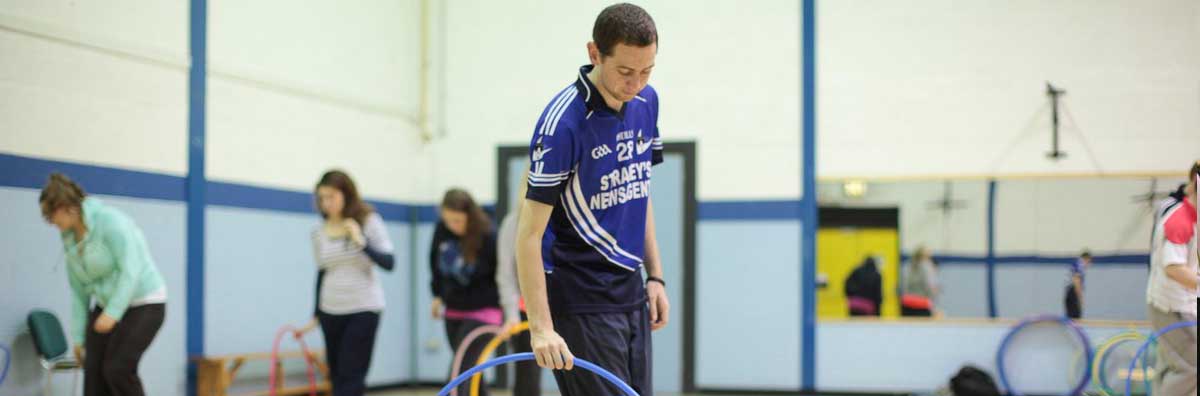 Froebel PE - Male Student with Hula Hoop - Maynooth University