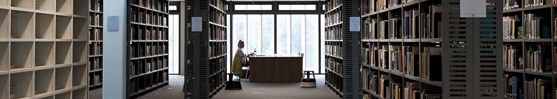 Library - Wide perspective with bookshelves - Maynooth University