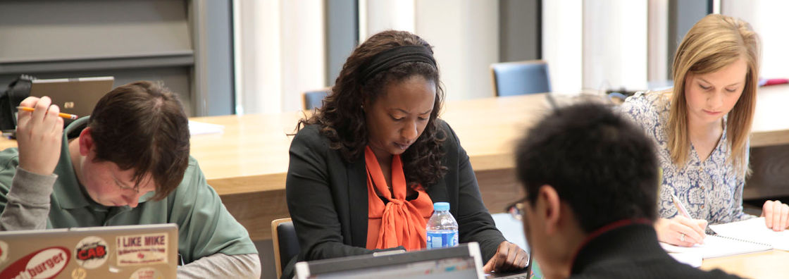 Postgraduate Student Studying in the Library at Maynooth University