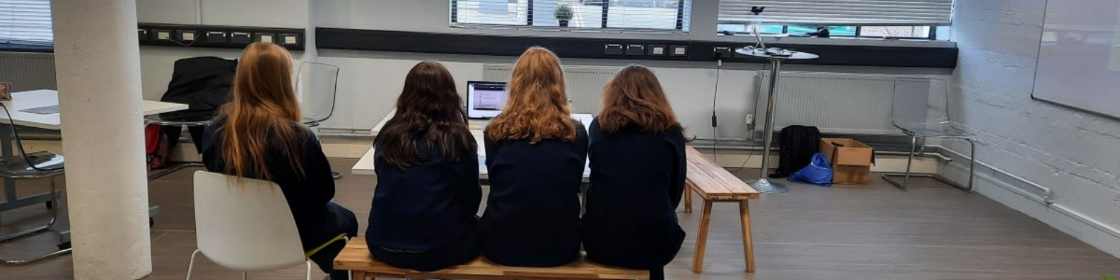Girls studying Science  a group of girls studying science and using technology
