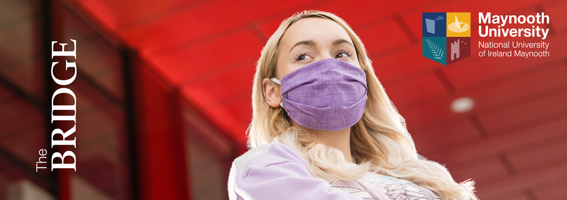 A student in a lilac mask stands in front of Eolas, this picture is the one used as the cover of the Bridge