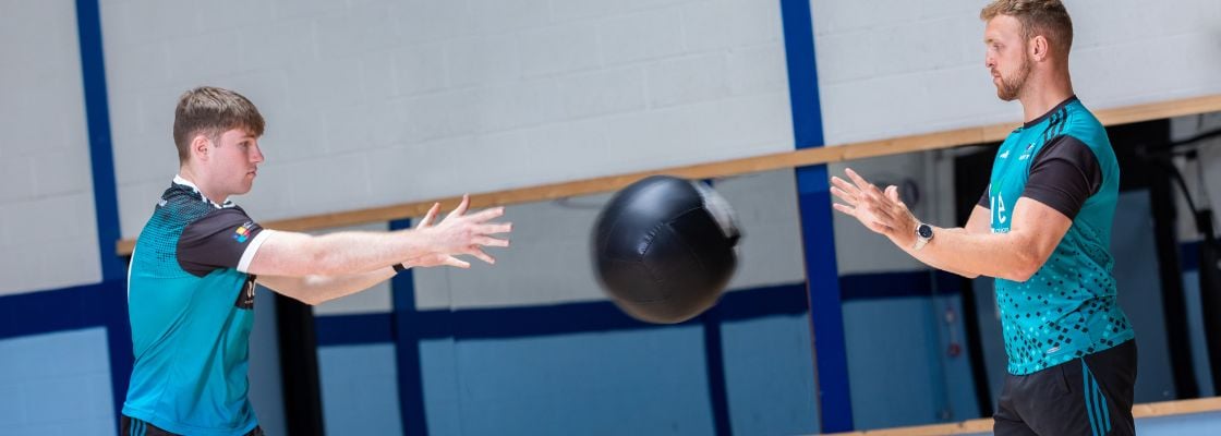 sports science figures throwing a ball