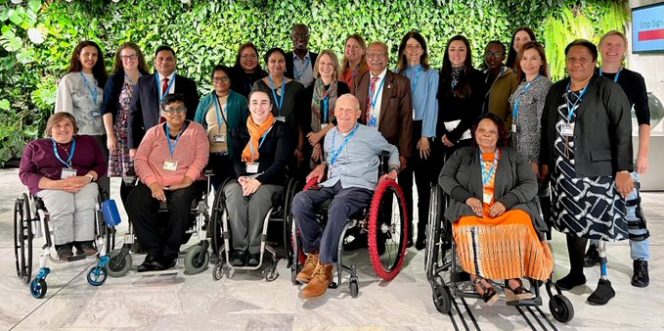 Group photo including Emma Smith pictured at the WHO GATE G;lobal Wheelchair Service Guidelines in person meeting in Geneva in October