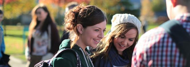 North Campus - Female Students Laughing - Maynooth University