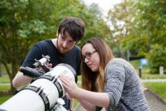 Communications & Marketing - Male and female students at telescope - Maynooth University