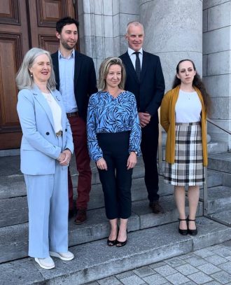 5 people pictured standing on steps: From Left to Right Prof Yvonne Galligan (TUD), Eoghan McCarthy (AIRO-MU), Dr Fiona Buckley (UCC), Justin Gleeson (AIRO-MU), Dr Lisa Keenan (TCD) 