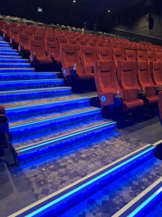 Image of tiered conference venue seating with led lit stairs