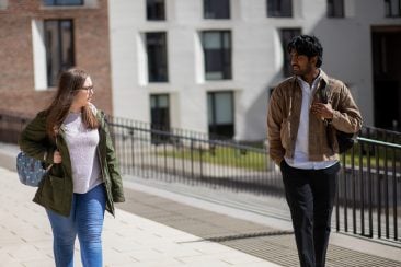 IO_2 MU students walking in campus