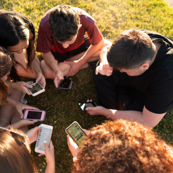 teenagers using mobile phones