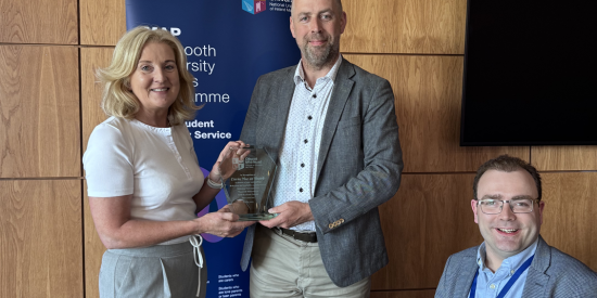 Ciaran mac an Bhaird receiving MAP award