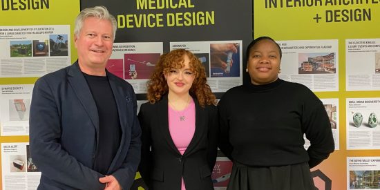 Image of Iain Macdonald, Zoë O'Sullivan & Oratile Mokgatla in front of poster display