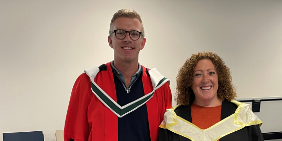 Dr Paul O'Keeffe and Niamh Rooney prepare to attend conferrals