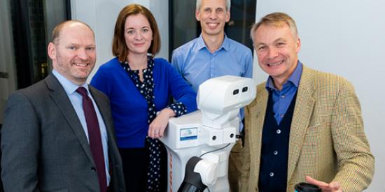 Photo caption: (l-r) Dr Michael Cooke, Assistant Prof in Applied Psychology; Dr Deirdre Desmond, Associate Prof, Department of Psychology and co-director of ALL Institute; Dr Rudi Villing, Assistant Prof in the Department of Electronic Engineering and Prof Mac MacLachlan, Co-Director of the ALL Institute, with PAL TIAGo robot funded with the support of Science Foundation Ireland (SFI)  