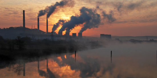 factory with smoke stacks 