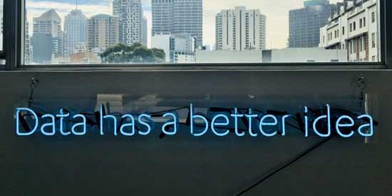 This picture shows a fluorescent sign saying 'Data has a better idea'