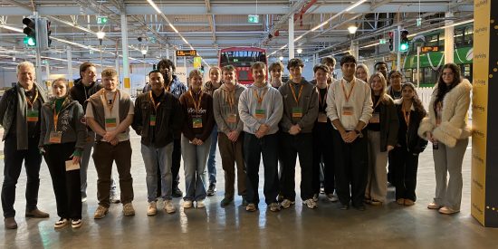 Image showing a group of students standing in a large hall