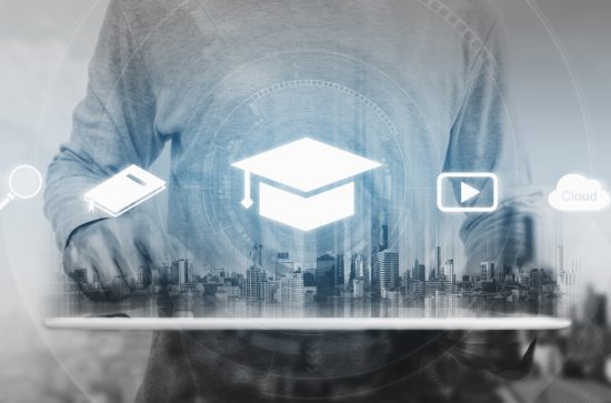 Man's torso behind a computer-generated image of a high-rise city with education icons superimposed 