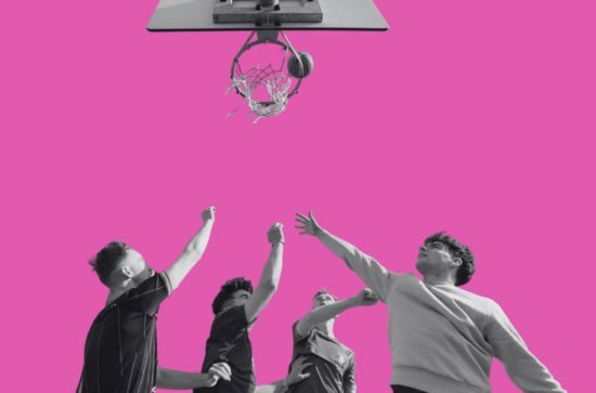 Students playing basketball, pink background.