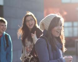 Communications - Students outside Iontas Builiding on Maynooth University 1200 x 396